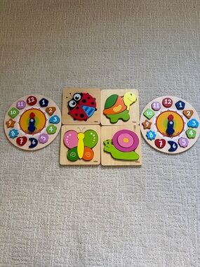 Bundle of six wooden educational puzzles